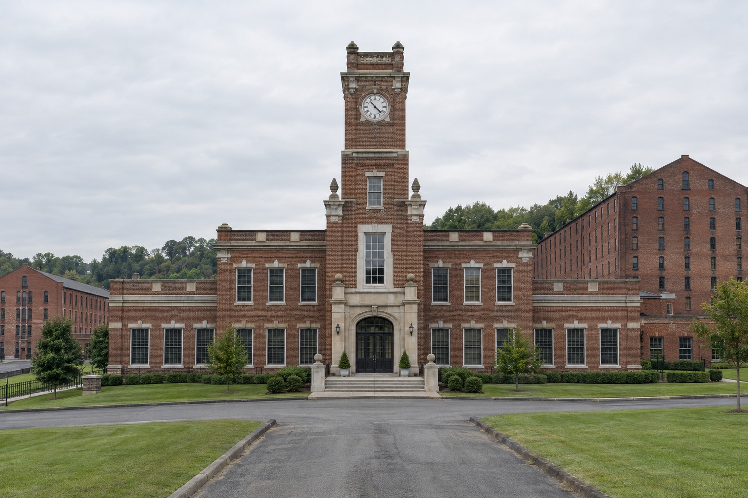 The brick clock tower and symmetrical entrance block of the Stitzel-Weller distillery in Shively, Kentucky, photographed in flat daylight with rickhouses behind it